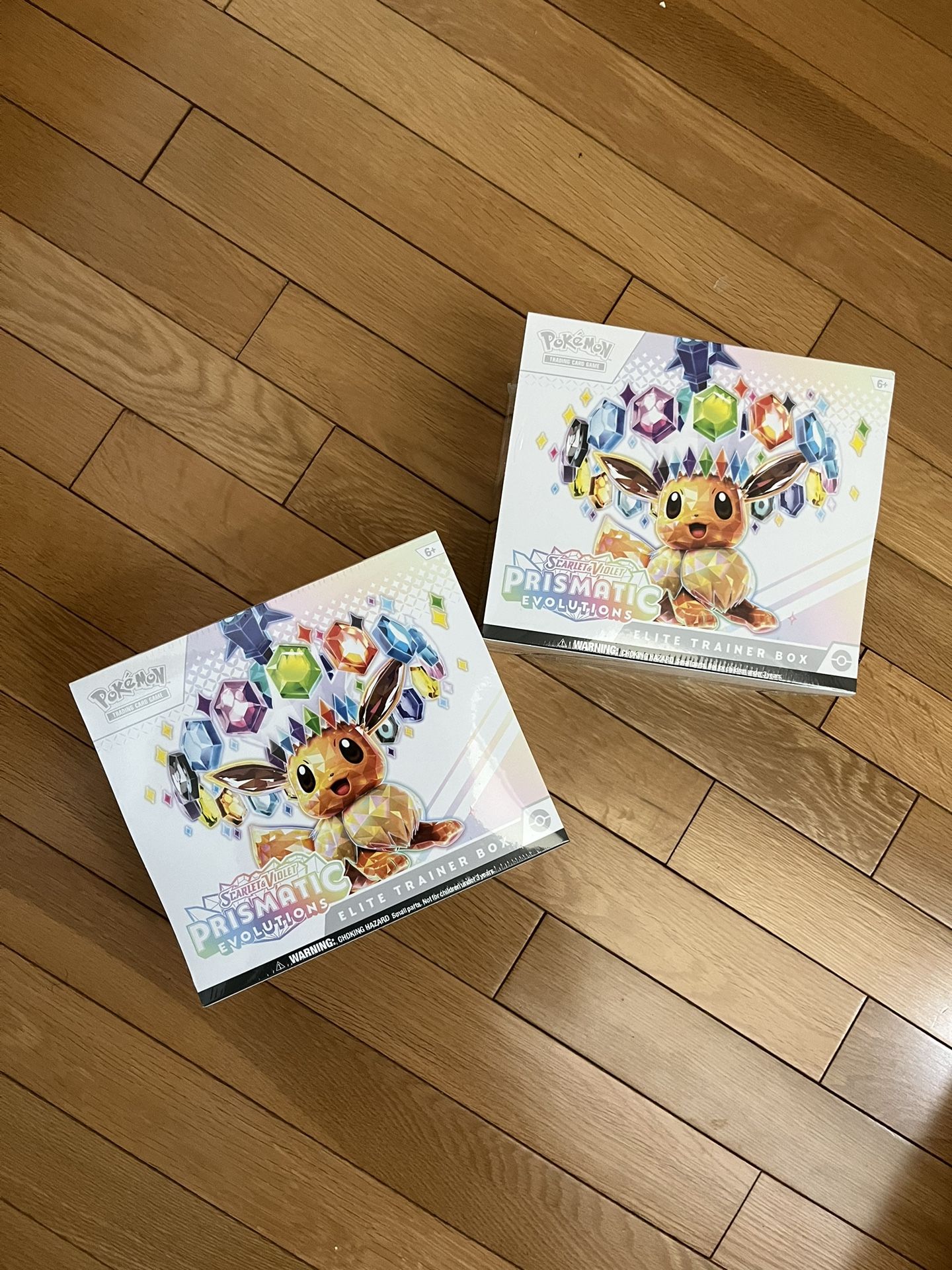 Pokemon Prismatic Evolution ETB $130/Box