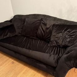 Free pickup asap Black velvet sofa bed with pillows - has slight dog hair needs to be vacuumed