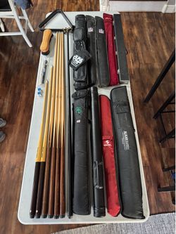 Lott of pool table cues / sticks and accessories. Billiards