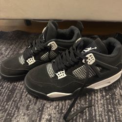 Air Jordan 4 Black and White Sneakers