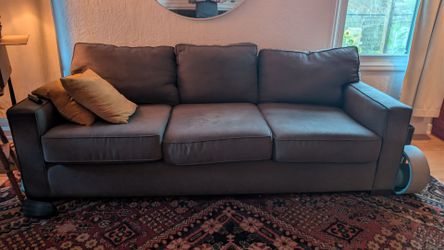 Large comfortable gray couch.
