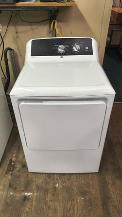 GE ELITE WHITE ELECTRIC DRYER. STILL IN NEW CONDITION