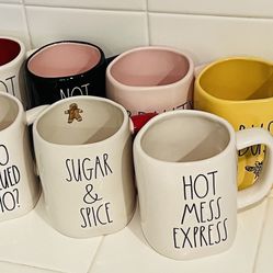 9 Rae Dunn Mugs 