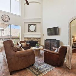 Brown Leather Reclining Sofa