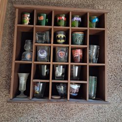 Shot glass rack with shot glasses