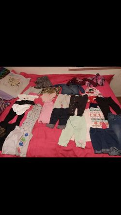 Grocery bag full of gently used girl clothes size 24 months