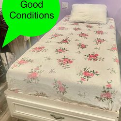 Twin bed with mattress