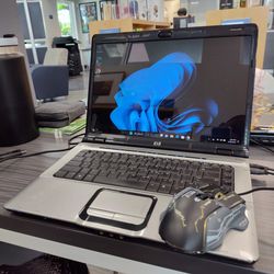 HP Laptop Comes With Wireless Mouse