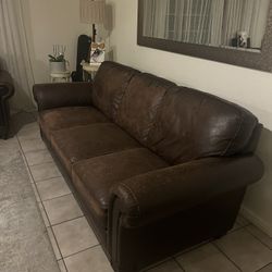 Brown leather sofas 