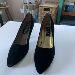 Pair Of Velvet Black Heels
