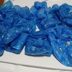 Disposable shoe covers. Approx 70 pairs