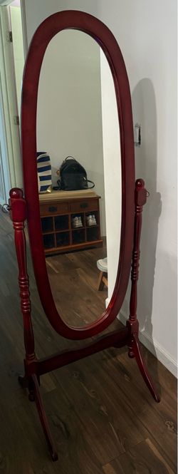 Full length adjustable mirror.