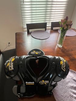 Riddell Power Surge youth shoulder pads…Brand new never worn !  Medium