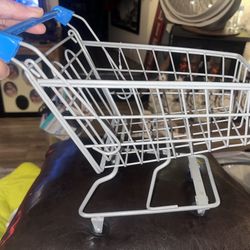 Preowned My Life As Shopping Cart Doll Toy Play Cart, in good condition . Compatible with 12-16” doll sizes. Located off lake mead and Simmon