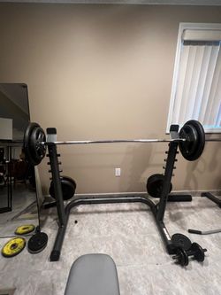 Adjustable bench and squat rack.