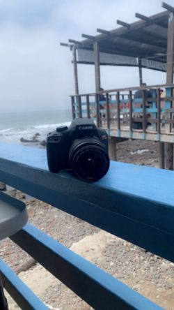 Canon T100