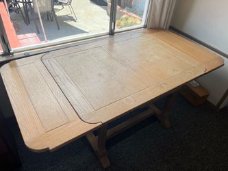 MCM versatile wood table. 4 ft. Expands to 5 or 6 ft.