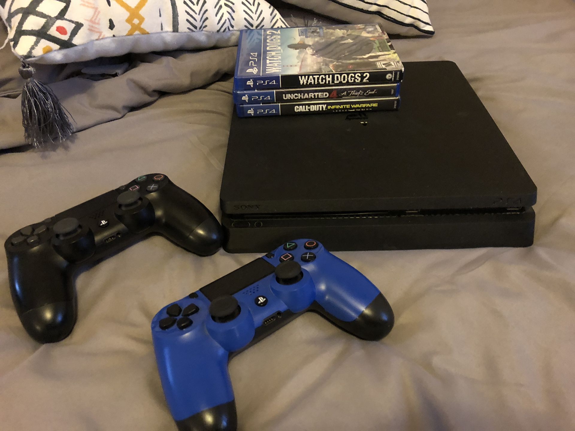 PS4 with controls and games