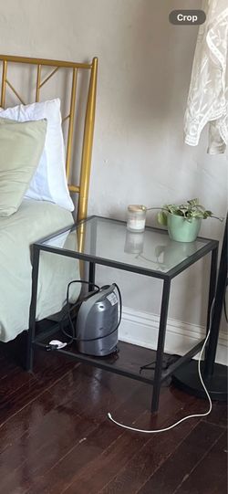 Small glass bedside table