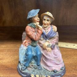 Sweet Loving Elderly Couple Sitting On A Bench Figurine