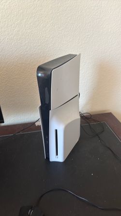 Sony PlayStation 5 Slim Console with Kbm,controller,mic, and monitor that runs 120 fps
