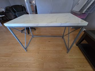 Table 42 x 22. No real marble.