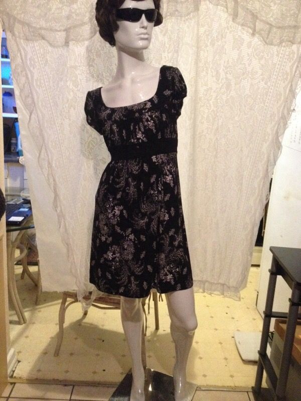 Speechless floral Sundress stretches for a comfortable and accommodating fit short sleeves polyester /spandex measurement Bust 34"-38" waist 28"-40"
