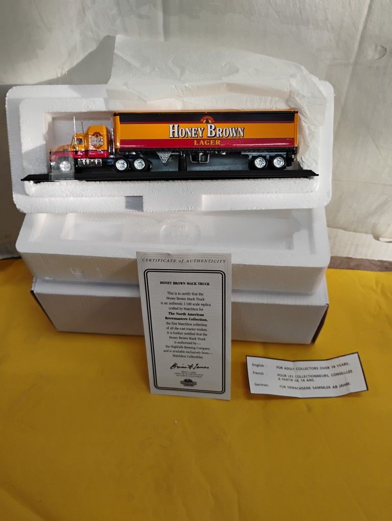 Honey brown lager Mack truck collectible with certificate