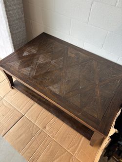 Dark wood rolling coffee table