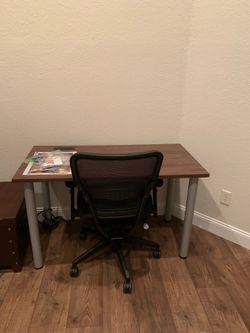 Desk with outlet and chair