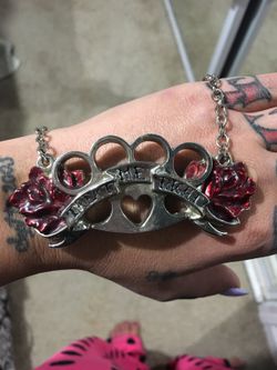 Brass knuckles necklace