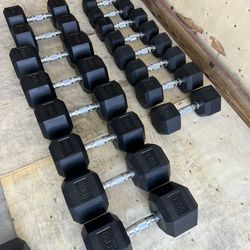 New pair of 10,15,20,25,30,45,50 and 55lb rubber dumbbells NEW IN BOX $500