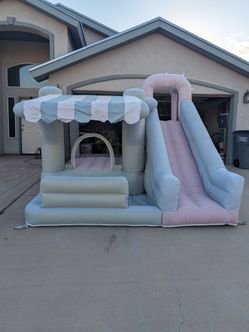 Jumping balloon with water slide