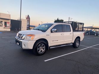 2011 Nissan Titan SV 4x4 – $7,200 OBO * Crew Cab, 4 puertas * V8 5.6L * 225,000 miles * 4x4 * Runs and drives great * Transmission rebuilt approximat