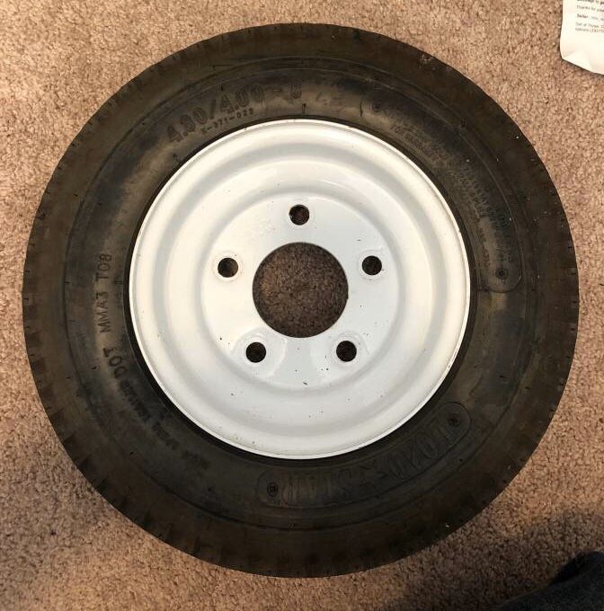 Brand new 4.80/4.00 - 8 five lug wheel/tire