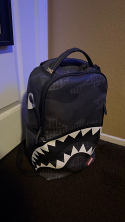Black spray ground backpack
