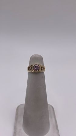 14k gold ring with purple CZ