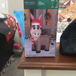 Holiday Living 4-ft LED Donkey with Santa Hat Christmas Inflatable. 