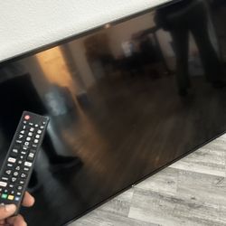 75 In Smart Tv With Subwoofer And Sound Bar. 