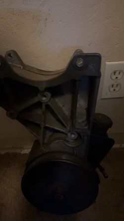 Power steering pump and bracket