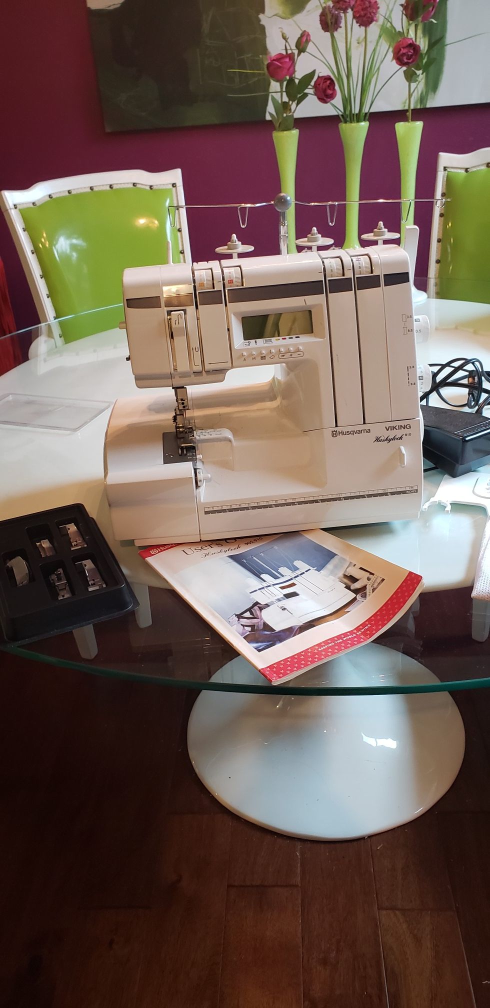 Husqvarna 910 Serger with extra feet, book and thread. for Sale in
