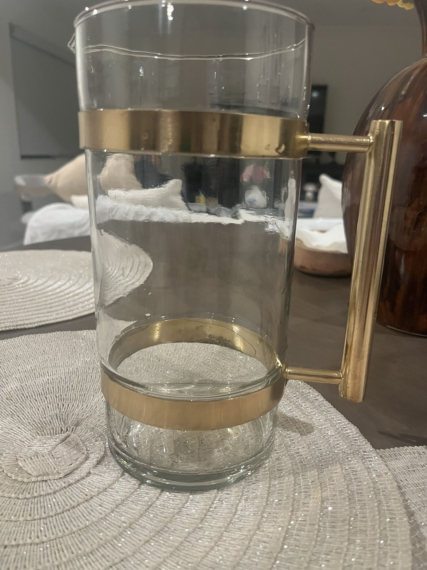 Glass Pitcher With Gold Iron Handel