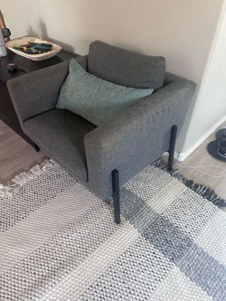 Gray Upholstered Accent Chair with Black Legs