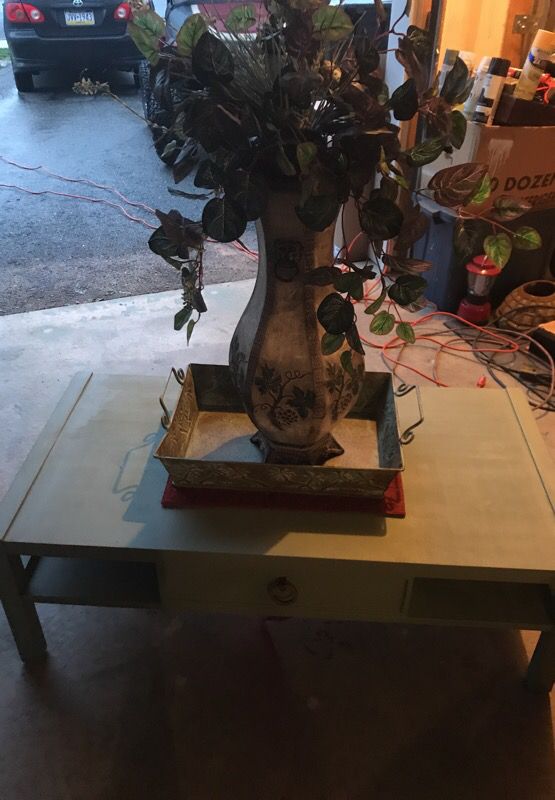 Table and flower and vase