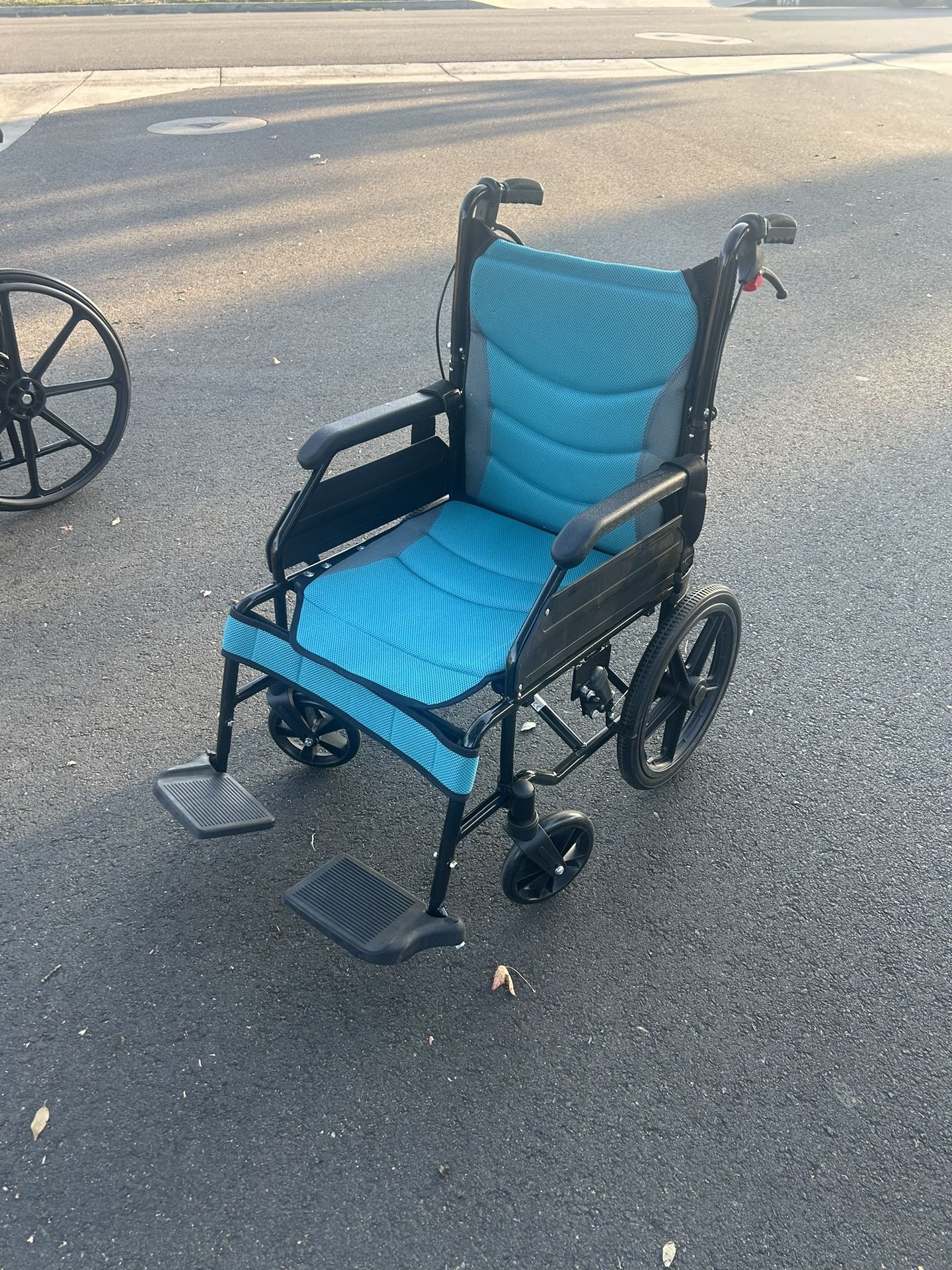 Brand New Folding Luxury Wheel Chair For $90