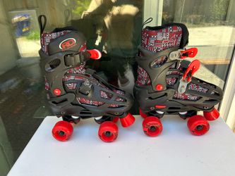 These are Roller Derby Falcon 2-in-1 combo skates featuring a red and black geometric patter