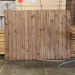 Rough Cedar Toned Pine fencing panels 