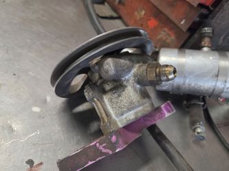 Power steering pump and reservoir