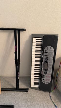 Casio keyboard with stand.