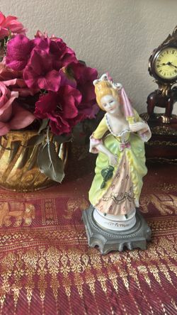 Antique porcelain figurine